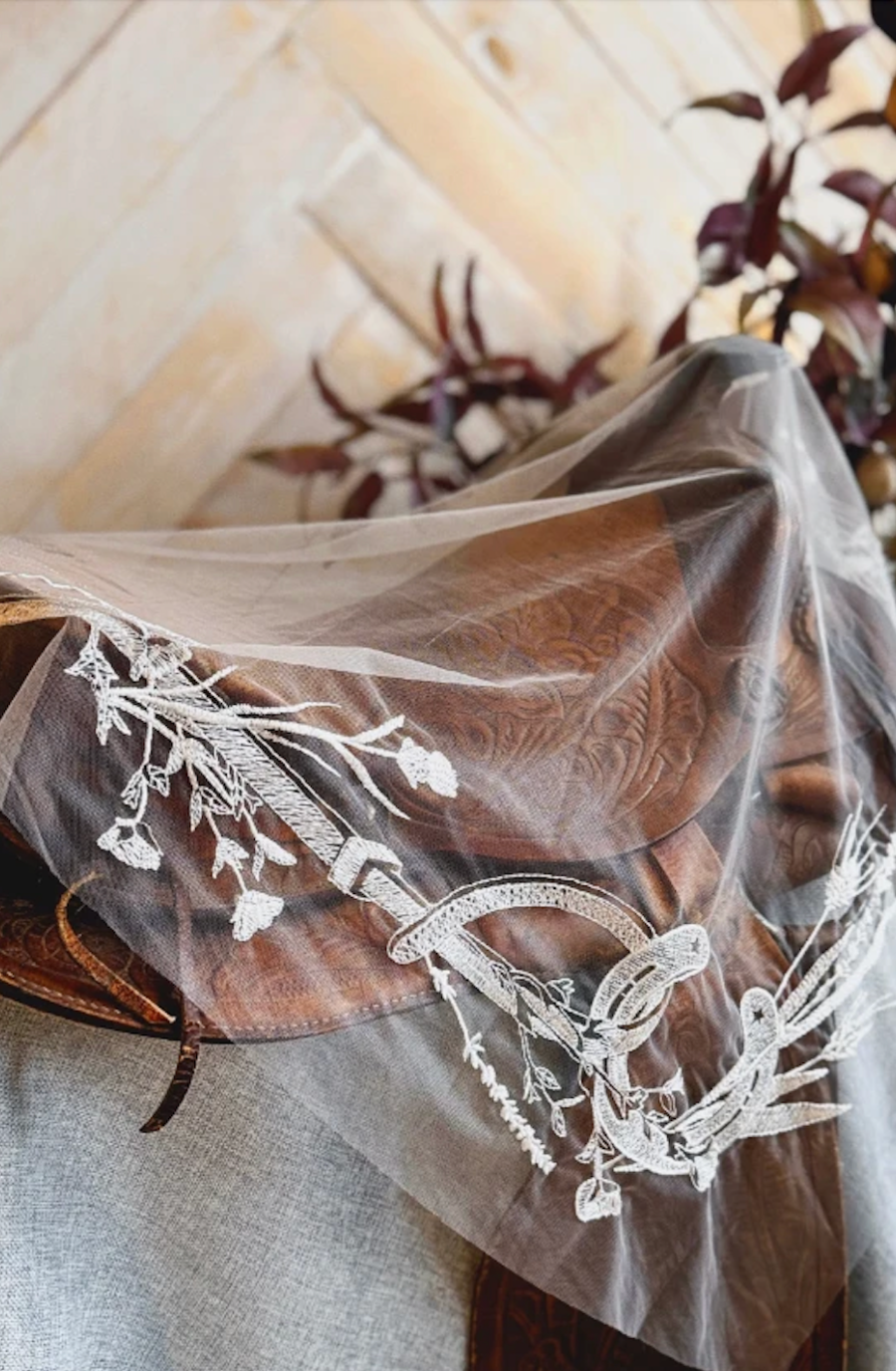 image shows one of the equestrian veils from the lambs hill bridal collection